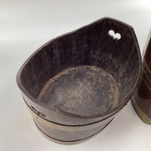 108 - A mahogany and brass bound peat bucket with brass liner, together with an oak and brass example, 31c... 