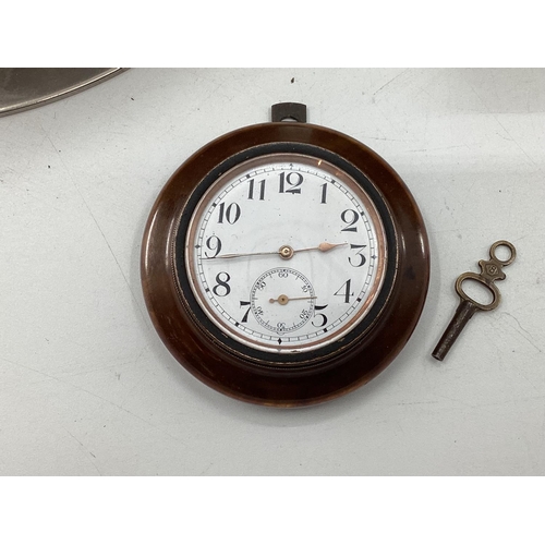 112 - A boxed gilt brass ships barometer in oak case by E J Dent, Paris, and a ships clock and a small bak... 