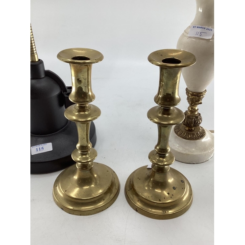 115 - Pair of gilt brass candle sticks and a modern adjustable wall lamp and one other