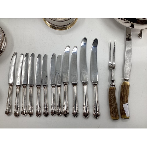 12 - Collection of electroplated and white metal items to include a pierced picture frame, cutlery and ot... 