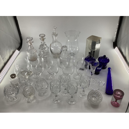 123 - Large collection of C20th glassware to include decanters, large wine glasses etc