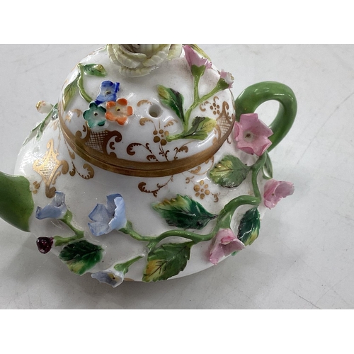 124 - Collection of C19th & C20th ceramics, a miniature Meissen style tea pot, a pair of Rockingham style ... 