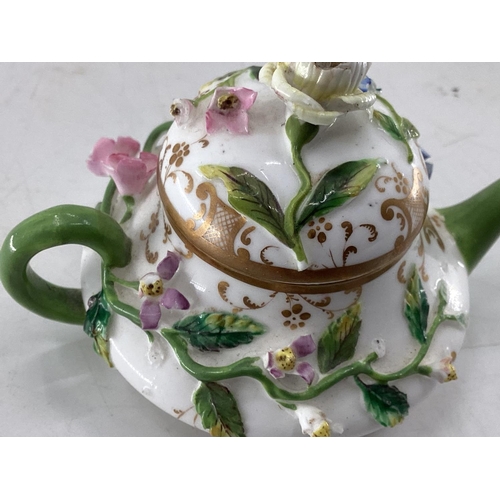 124 - Collection of C19th & C20th ceramics, a miniature Meissen style tea pot, a pair of Rockingham style ... 