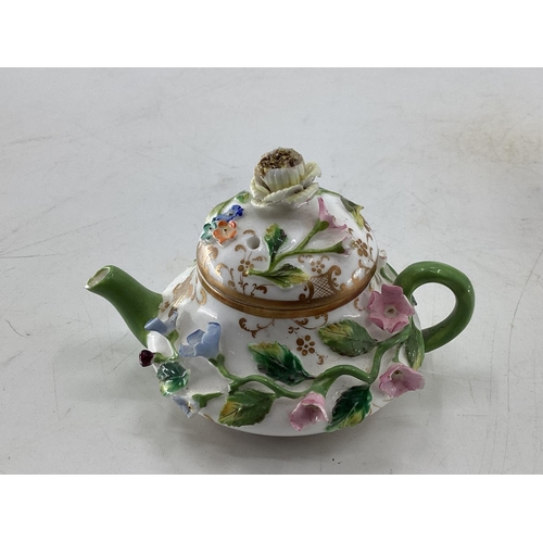 124 - Collection of C19th & C20th ceramics, a miniature Meissen style tea pot, a pair of Rockingham style ... 