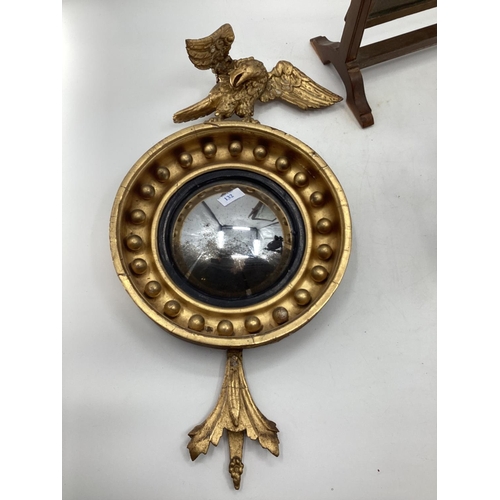 132 - Gilt wood convex mirror topped by a carved eagle, with 2 other mirrors