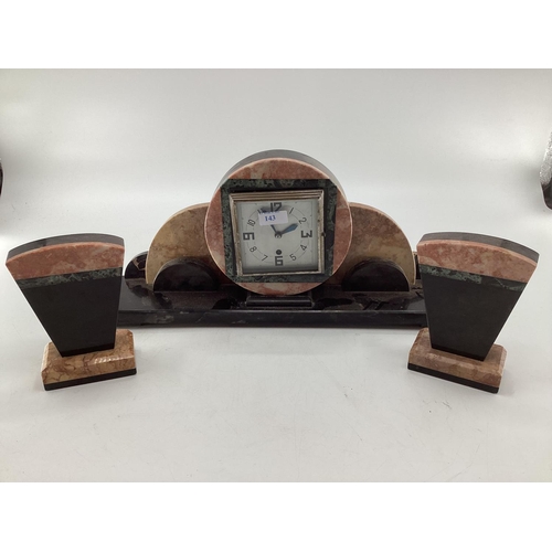 143 - An Art Deco marble mantle clock and garniture Width 60, Height 40 and Depth 13 cm Clock Height 18 cm... 