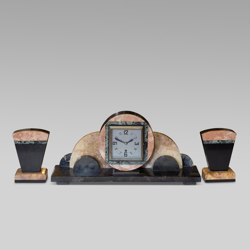 143 - An Art Deco marble mantle clock and garniture Width 60, Height 40 and Depth 13 cm Clock Height 18 cm... 