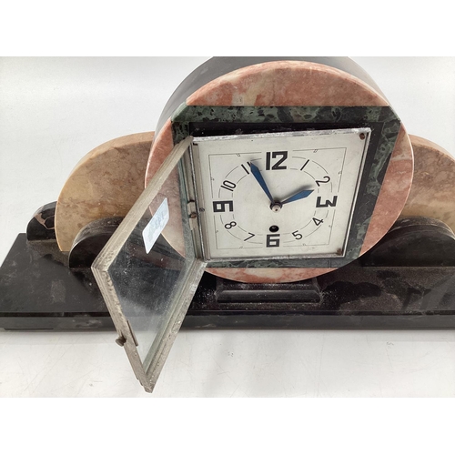 143 - An Art Deco marble mantle clock and garniture Width 60, Height 40 and Depth 13 cm Clock Height 18 cm... 