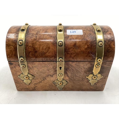 149 - Walnut and brass bound dome topped tea caddy, 24 x 18 x 12cm