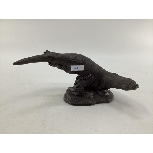 155 - A resin model of an otter by Tim Mackie, on Naturalistic base, 30 x 16cm