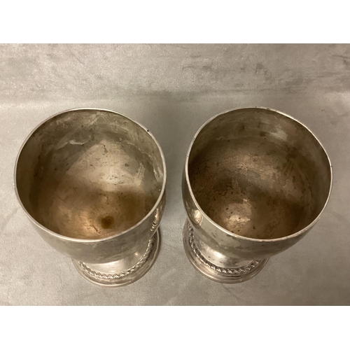 16 - A pair of Sterling Silver goblets by M H Dublin, 1894, 600g