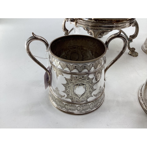 17 - A silver plated five piece tea set with ornate decoration, Bacchus mask spouts engraved to jugs with... 