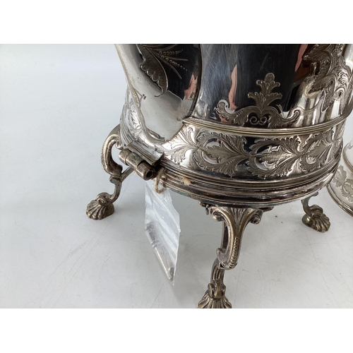 17 - A silver plated five piece tea set with ornate decoration, Bacchus mask spouts engraved to jugs with... 