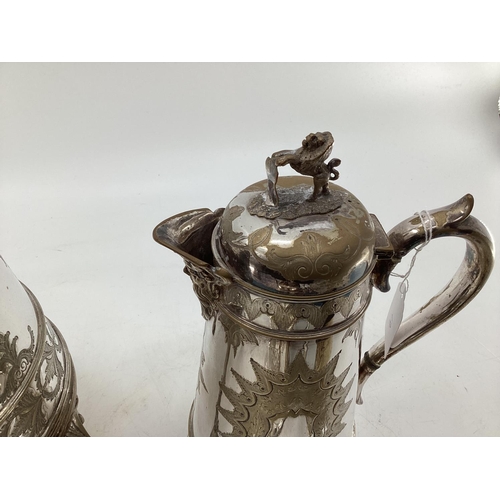 17 - A silver plated five piece tea set with ornate decoration, Bacchus mask spouts engraved to jugs with... 