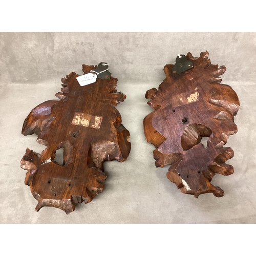 178 - A pair of carved wooden wall sconces , each depicting a pair of game birds on an oak branch, each ap... 