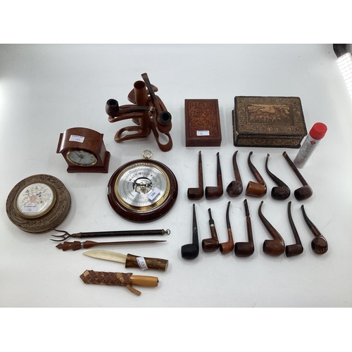 186 - A collection of miscellaneous items to include a collection of vintage pipes, boxes, paper knives, w... 