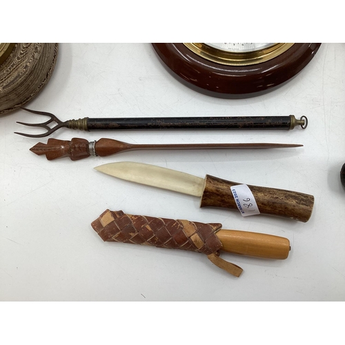 186 - A collection of miscellaneous items to include a collection of vintage pipes, boxes, paper knives, w... 