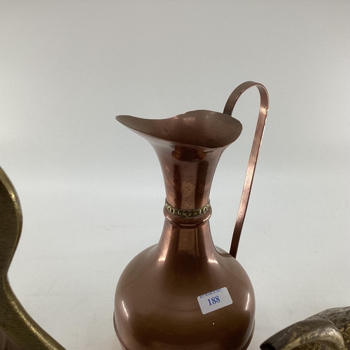 188 - A collection of metalware to include Middle Eastern style ewers, trench art and other items