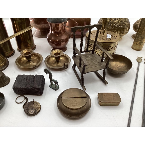 188 - A collection of metalware to include Middle Eastern style ewers, trench art and other items