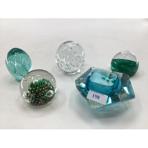 198 - A collection of paperweights and other glass items to include Caithness