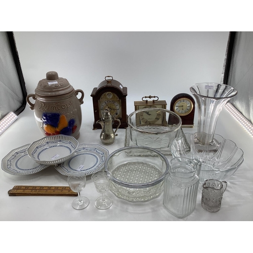 200 - A miscellaneous collecting of items to include glassware, a rumtopf lidded jar, mantle clocks and ot... 