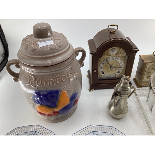 200 - A miscellaneous collecting of items to include glassware, a rumtopf lidded jar, mantle clocks and ot... 