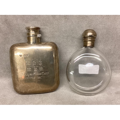 21 - A sterling silver hip flask by John William Johnson, Lonson 1886, and a silver topped circular glass... 