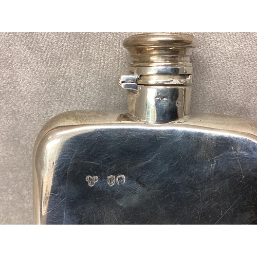 21 - A sterling silver hip flask by John William Johnson, Lonson 1886, and a silver topped circular glass... 