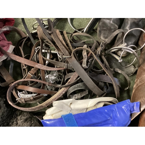 212 - Quantity of various horse tack, and a leather saddle