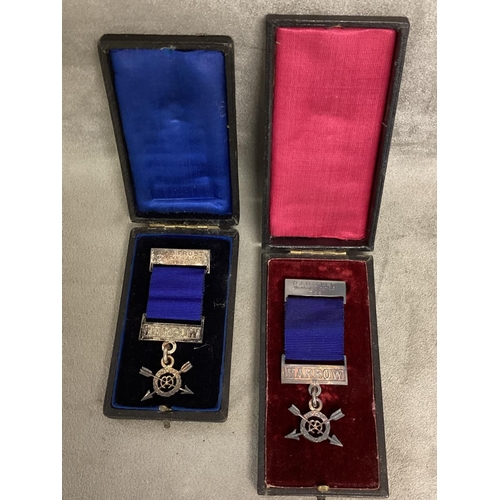 37 - Two cased medals, labelled Harrow, D J B Frost, Bantam weight 1921, with some wear, and another simi... 