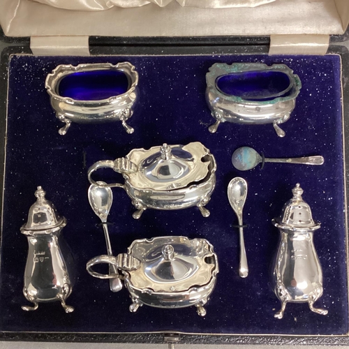 44 - A boxed sterling silver condiment set  by Walker and Hall, Chester, 1939    grams