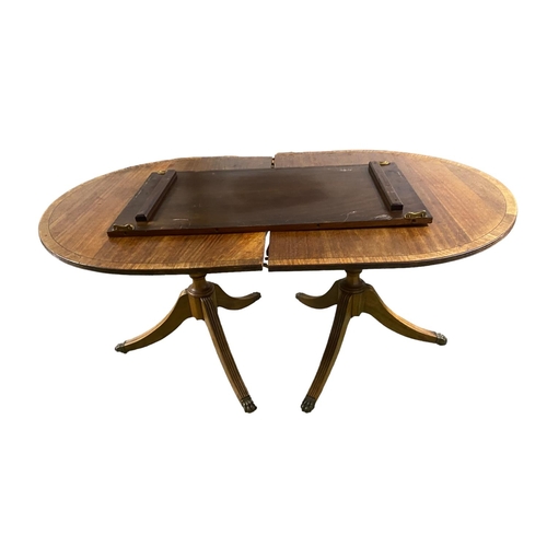 450 - A modern reproduction twin pedestal dining table, with extra leaf, as found Extended 211cm L x 97cm ... 