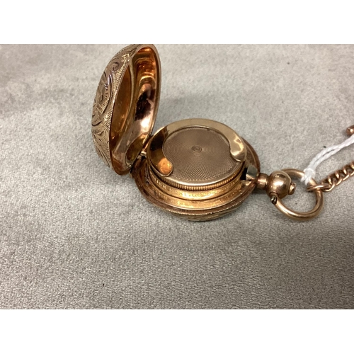 6 - An unmarked yellow metal sovereign fob case on a 9ct fancy link albert chain (one lobster clasp unma... 