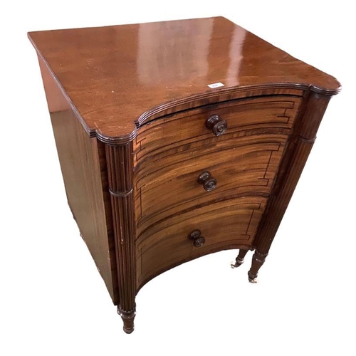 428 - A large Regency  mahogany inverted bow front commode with reeded columns and turned raised legs to c... 