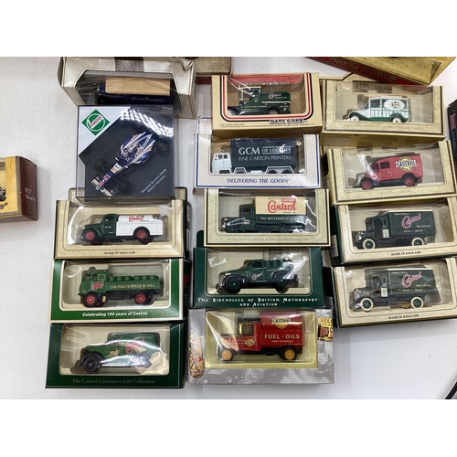 102 - Collection of boxed tin plate toy cars to include Matchbox, Dinky, Vanguard and other makers