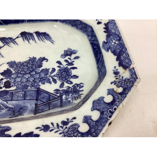 108 - Four blue and white serving dishes together with a porcelain circular tray with gilt handles, larges... 