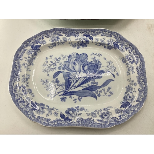 108 - Four blue and white serving dishes together with a porcelain circular tray with gilt handles, larges... 