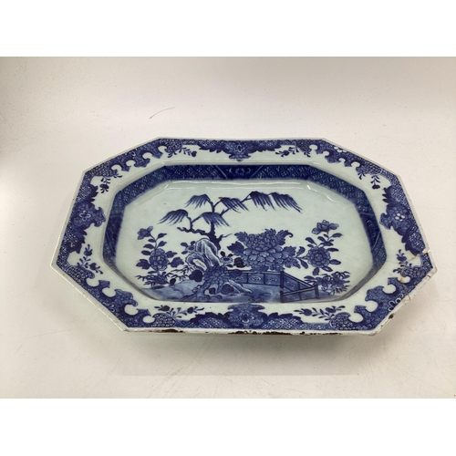 108 - Four blue and white serving dishes together with a porcelain circular tray with gilt handles, larges... 