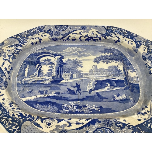 109 - Two large late C19th blue and white oriental style meat plates, largest 54cm x 40cm