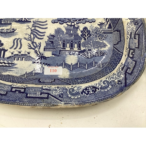 110 - Four ceramic Willow Pattern serving dishes, largest 43cm x 35cm (some wear etc, see images)