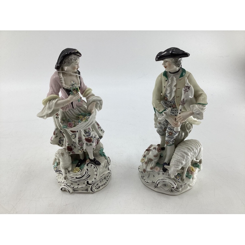 113 - Pair of Derby Porcelain figures, gentleman playing bagpipes together with a lady carrying flowers an... 