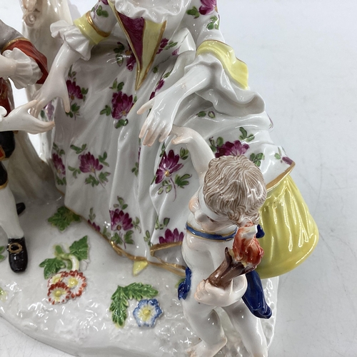 114 - Two Meissen style figural groups, blue crossed sword mark to base.  Largest is 19cm H (some wear and... 