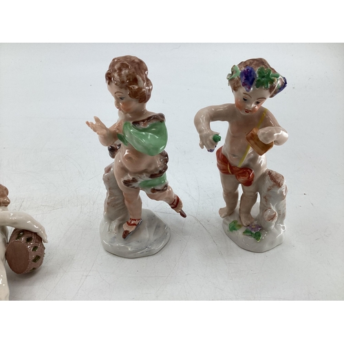 115 - Collection of 6, early C20th, Capodimonte figures to include a set of 4 cherubs