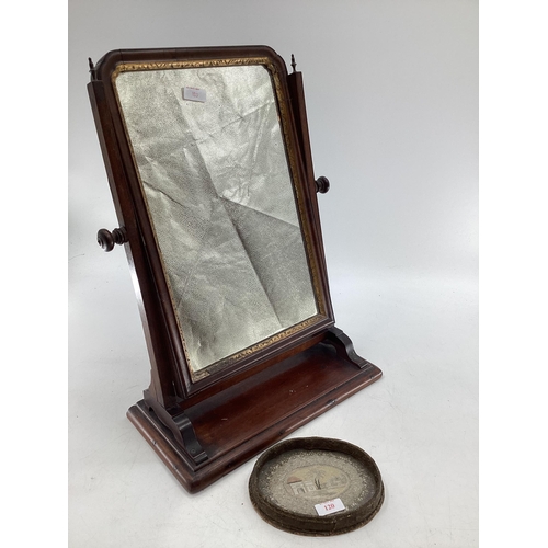 120 - C19th Mahogany swing mirror together with a small C19th dish with inset embroidery panel