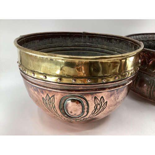 128 - Collection of metalware to include a Victorian copper planter a large brass and copper planter a pai... 