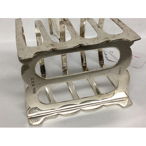 14 - A Sterling silver toast rack, James Dixon and Sons, Sheffield, 1904, 167g