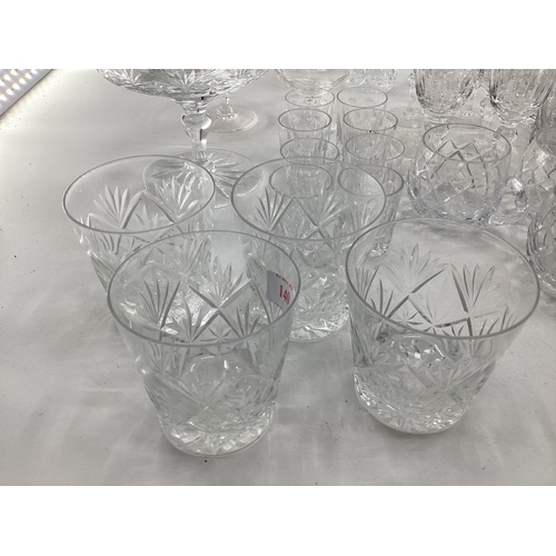 140 - A collection of crystal glassware to include brandy balloons, tumblers etc