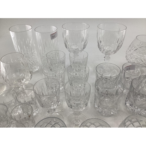 140 - A collection of crystal glassware to include brandy balloons, tumblers etc