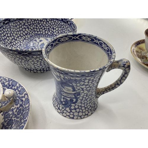 141 - A collection of mixed ceramics to include a Wedgwood Runneymede coffee set, and a collection of blue... 