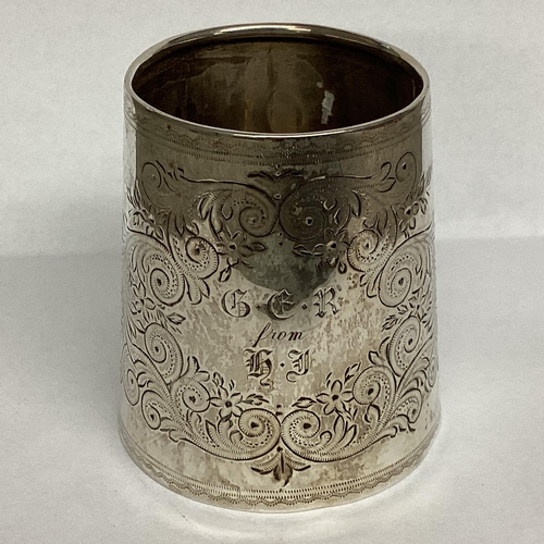 15 - A Sterling silver mug with chased scrolling decoration, loop handle, Birmingham 1910 7.5cmH, 96g